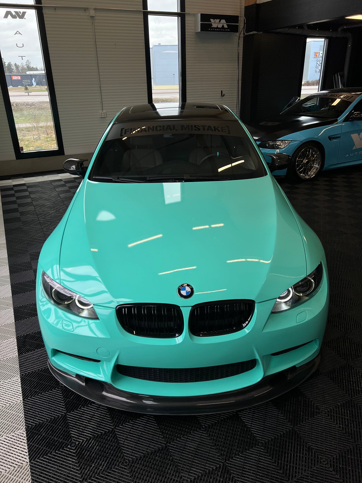 Windshield sticker "Financial Mistake"