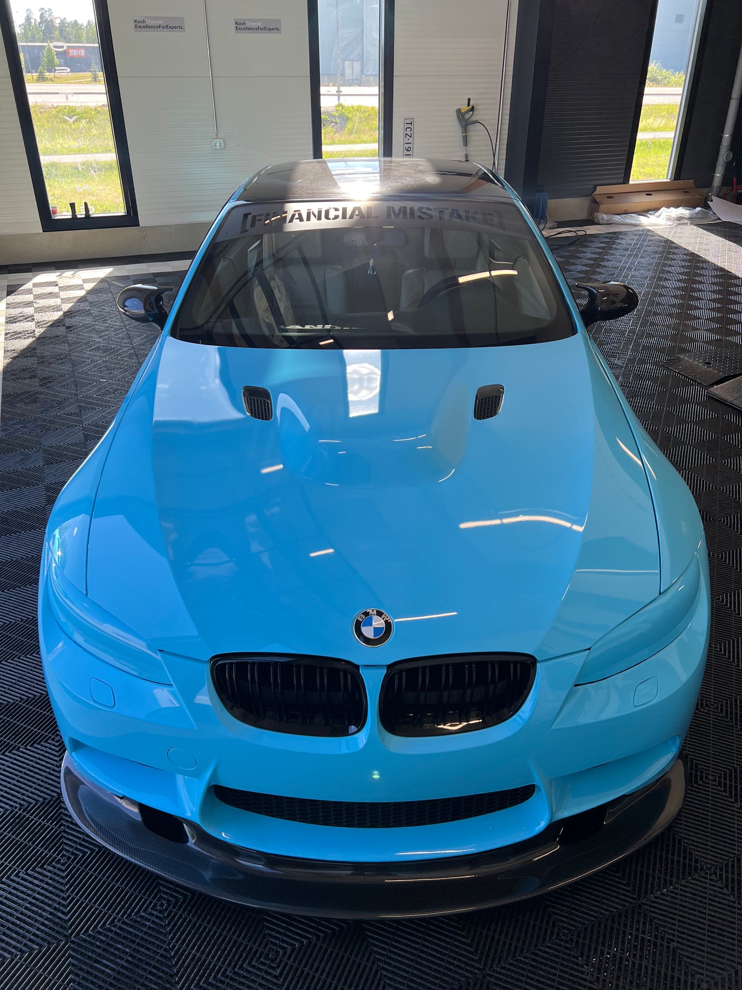 Windshield sticker "Financial Mistake"